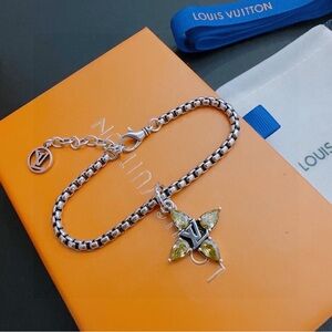 Louis Vuitton Silver Bracelet with Green Crystal Fleur Charm